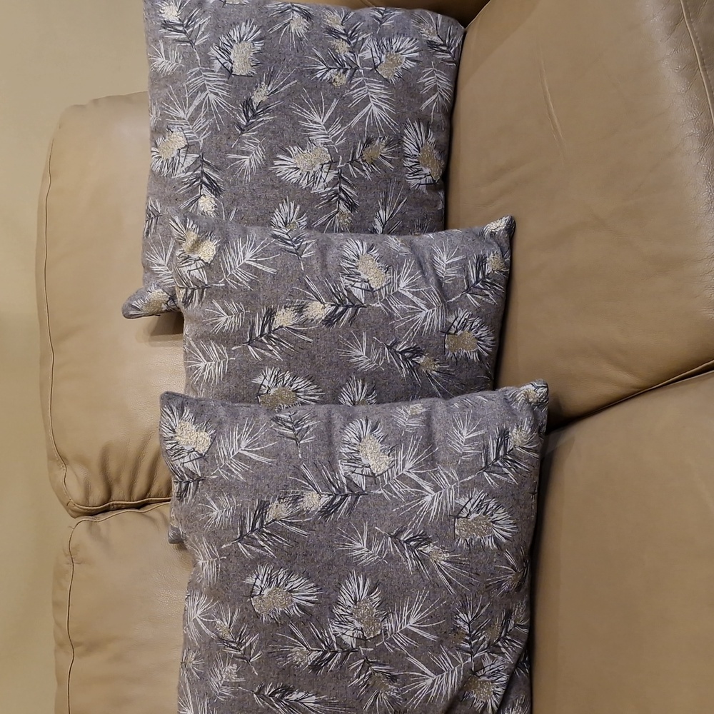 Silver and gray throw pillows
